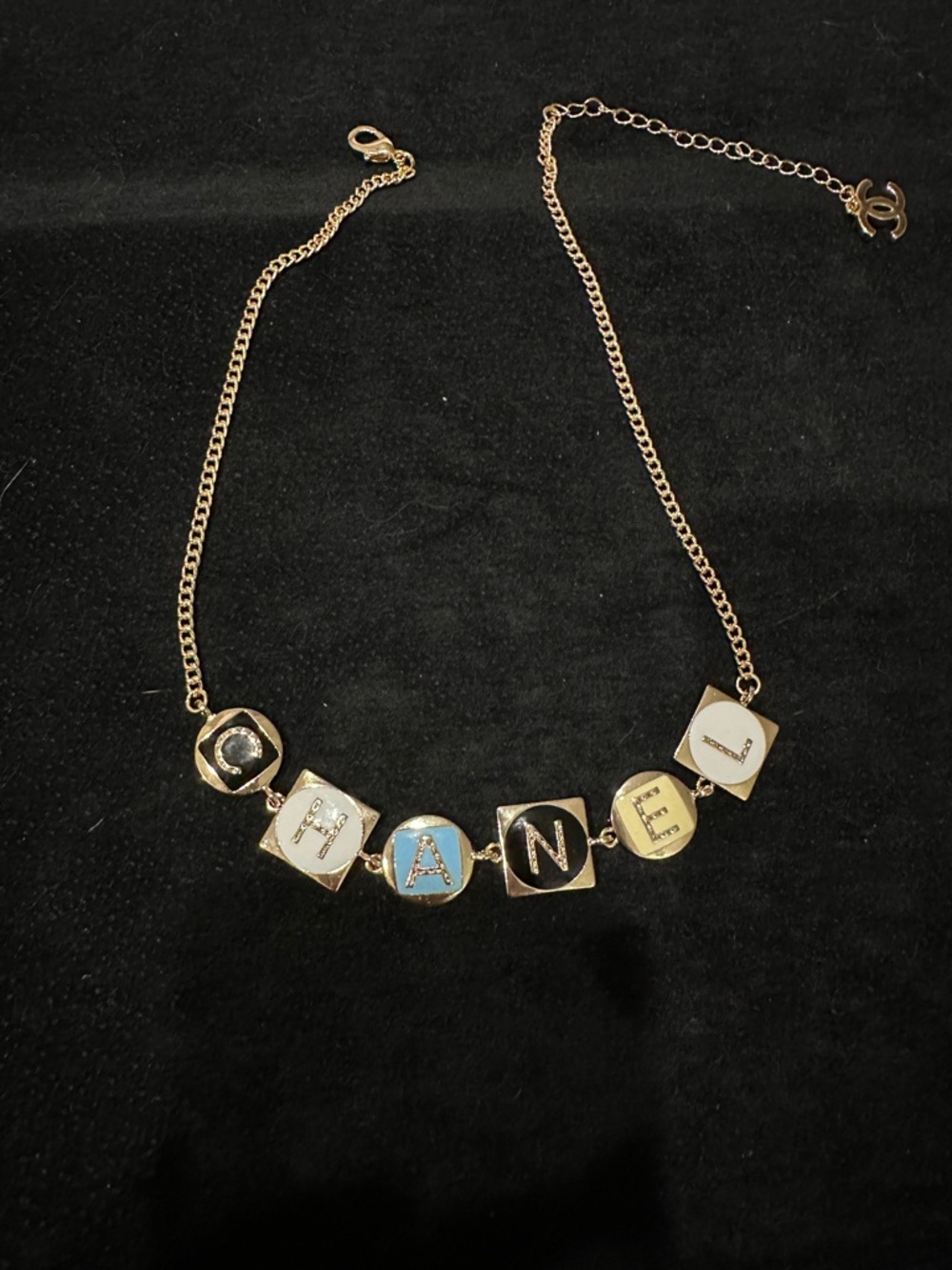 CHANEL Gold-Tone Letter Necklace with Blue, White, Black Inlays